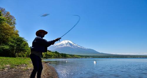 东北夏季水库钓鱼技巧与方法（探秘东北夏季水库钓鱼技巧，轻松捕获丰富渔获）  第2张